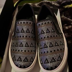 Never worn size 9 slip on shoe black color with black gold silver rhinestones